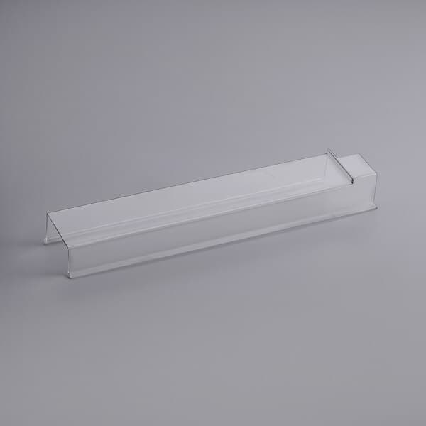 A clear plastic rectangular container with a long white rectangular handle.