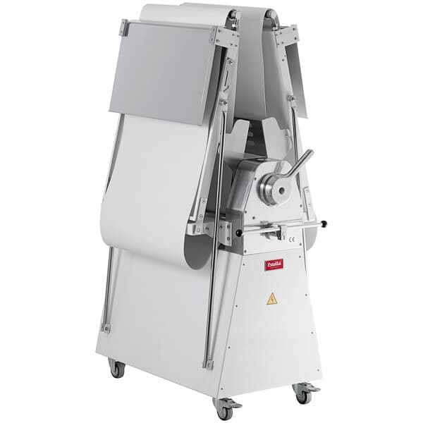 A large metal Estella floor dough sheeter with white cover on wheels.