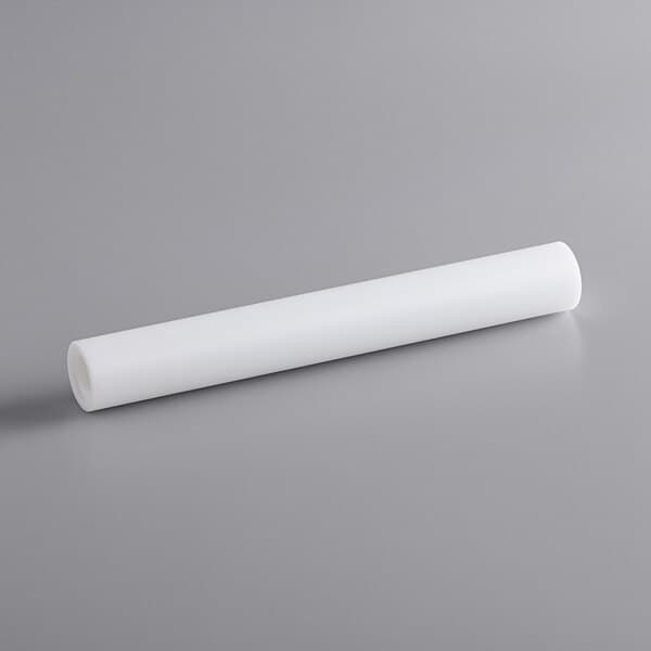 A white plastic tube labeled "Estella 348PEDS50B" on a gray surface.