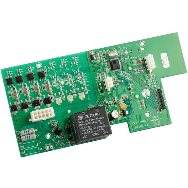 The control panel for an Estella Caffe coffee maker with a green circuit board and black and white components.