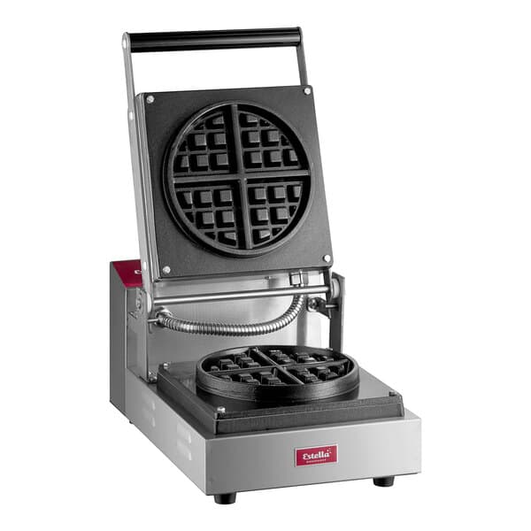 A black and white Estella press-style Belgian waffle maker with a round waffle pattern.