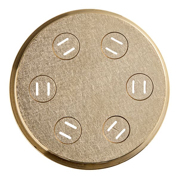 A circular gold Estella Tagliatelle pasta die with holes in it.