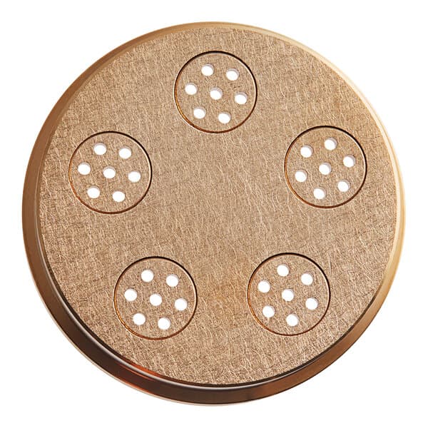 A circular metal pasta die with holes in it.