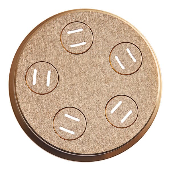A round metal pasta die with four holes in it.