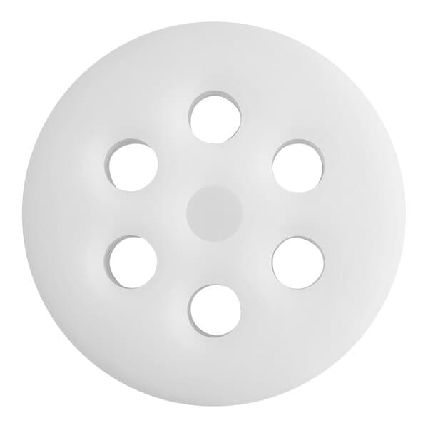 A white plastic circle with holes.