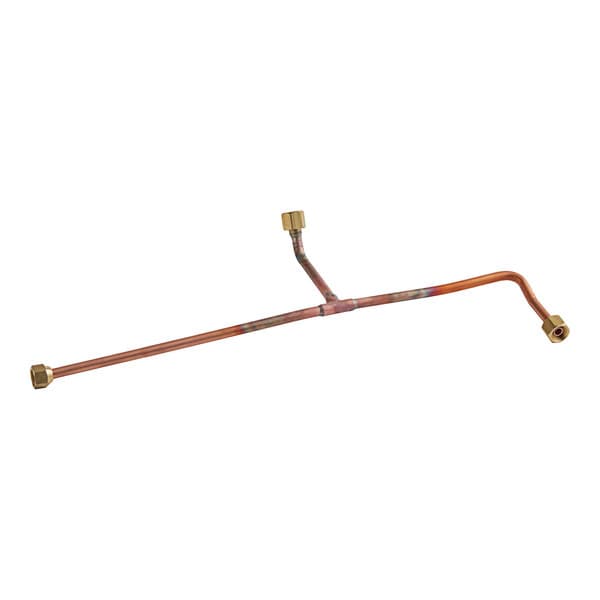 A copper pipe with a brass valve on it.