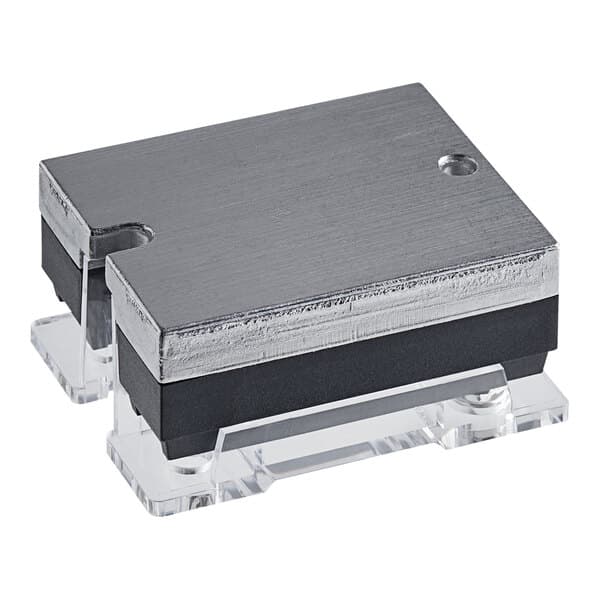 A small silver metal Estella Caffe solid state relay.