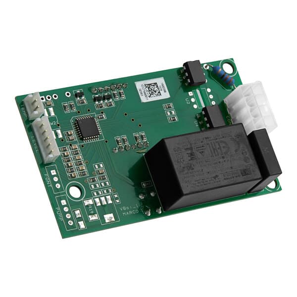 A green circuit board with many small components and black text on a black rectangular object.