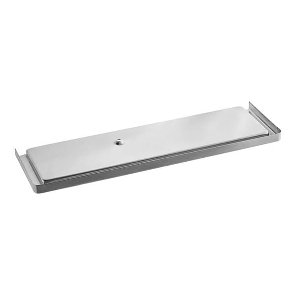 A silver rectangular metal drain pan with a round button.