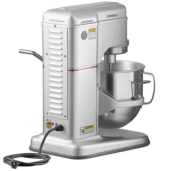 A silver Estella countertop mixer with a cord attached.
