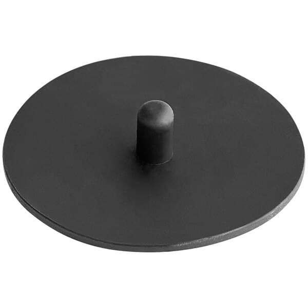 A black cylindrical rubber backflush disk.
