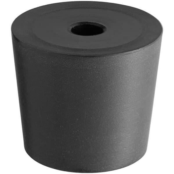 A black rubber bumper cup with a hole in it.