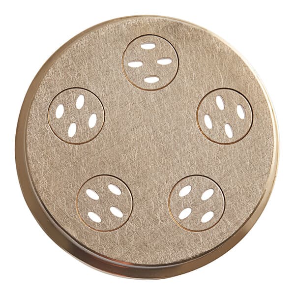 A circular brass plate with holes in it.