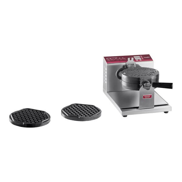 A black Estella Belgian waffle maker with hexagon plates on a counter.